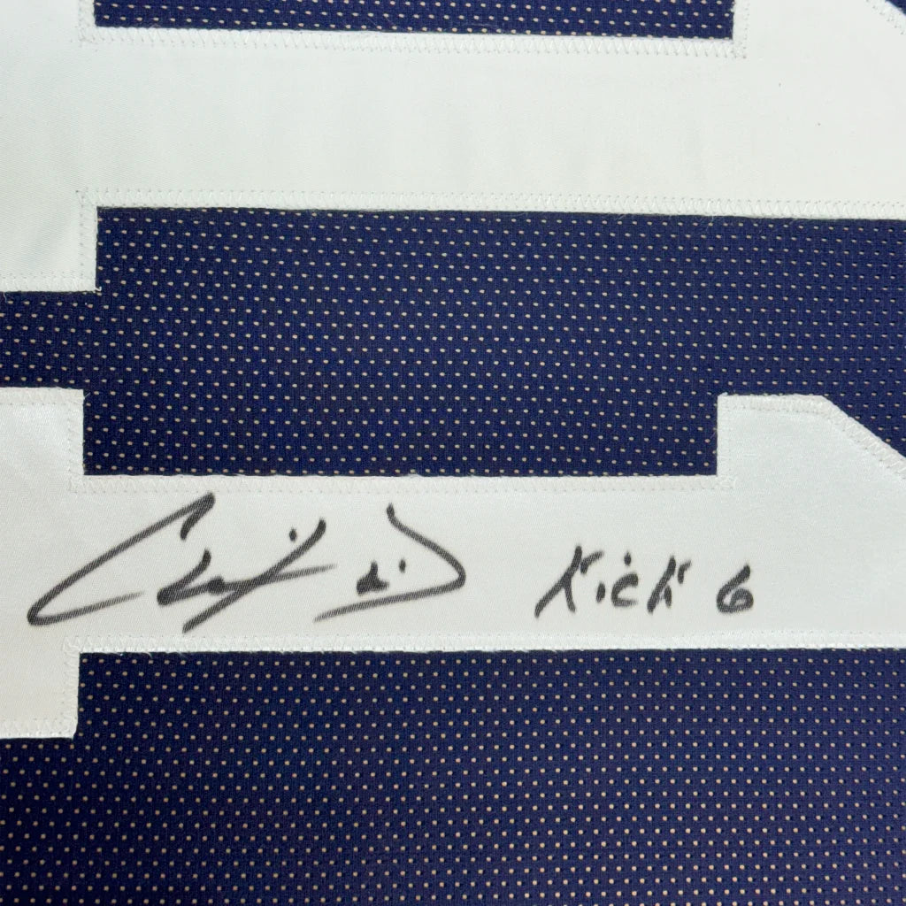 Autographed blue and white Sports Jersey from Championship Ready C Davis Jr display