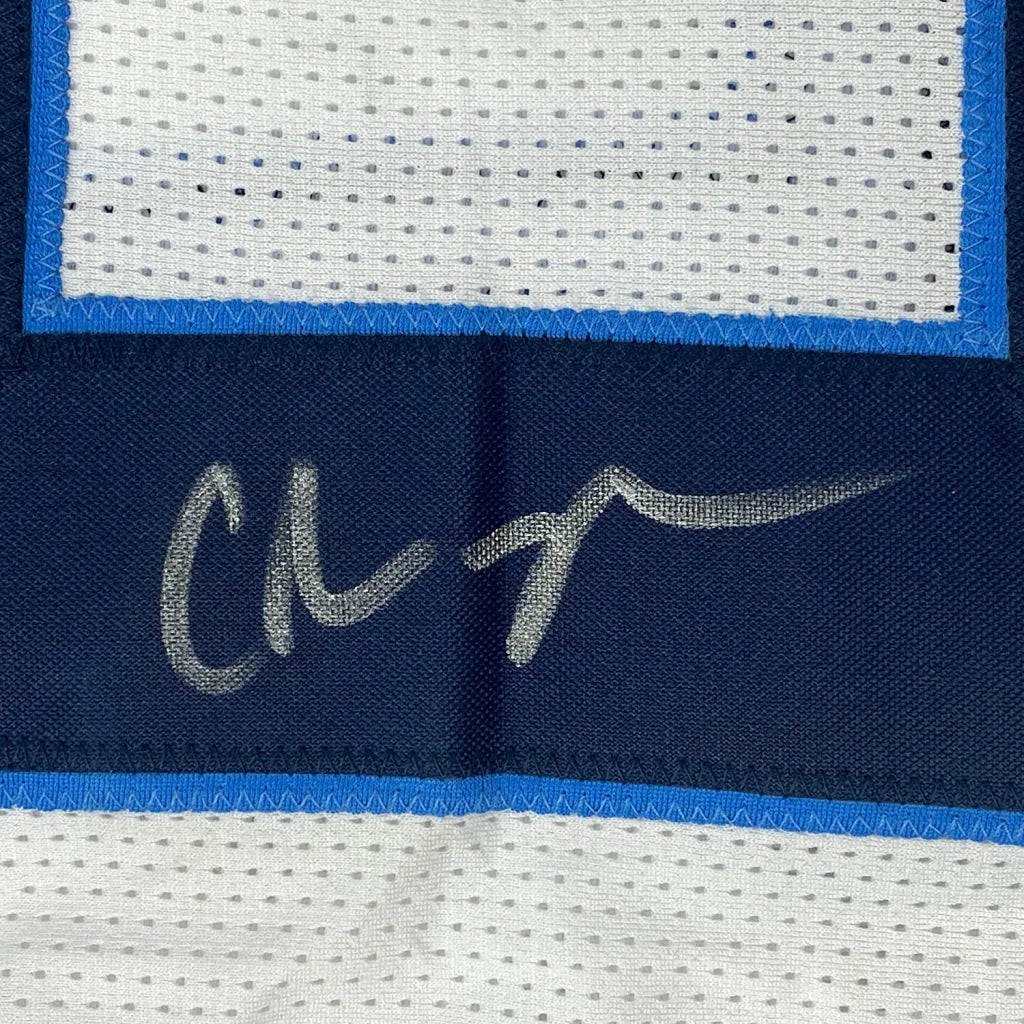 Autographed white and blue Chris Johnson Titans jersey ready to display