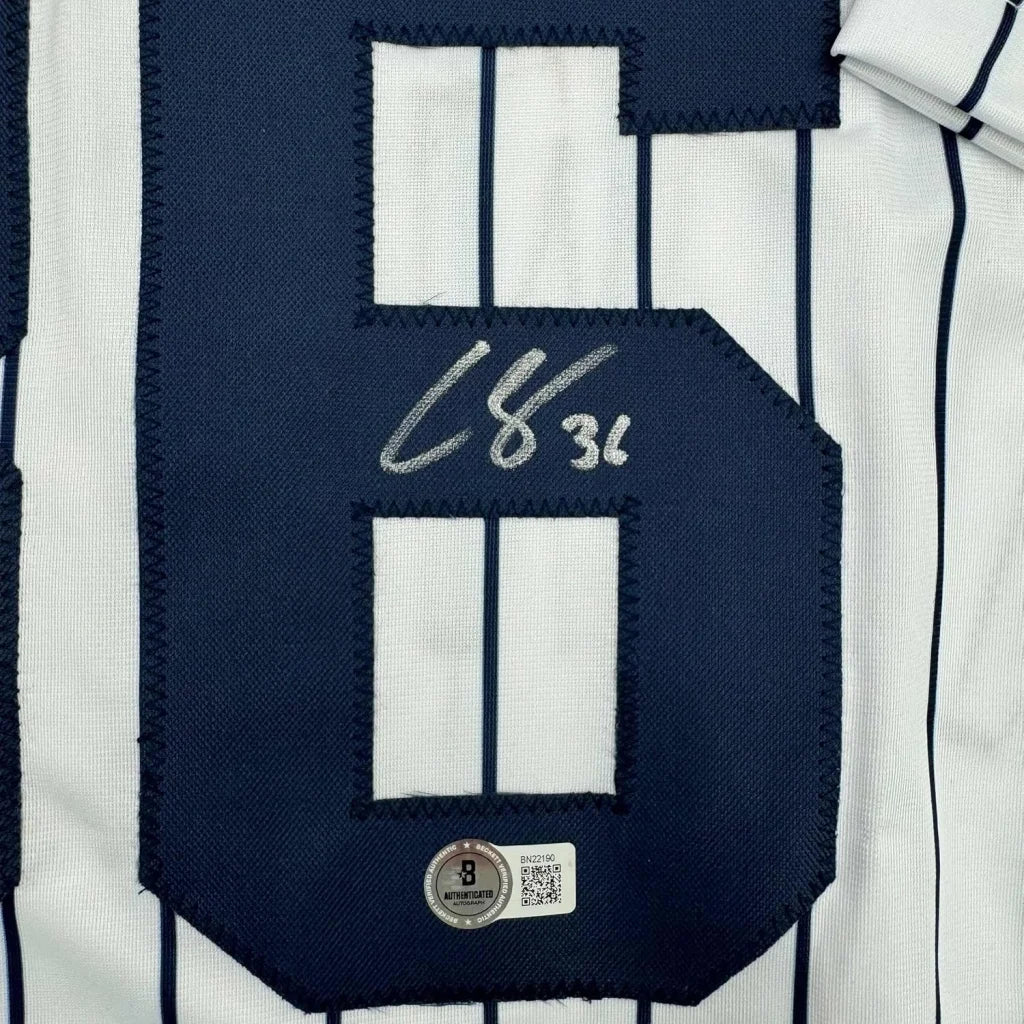 Framed autographed Clarke Schmidt New York Yankees pinstripe jersey number 6