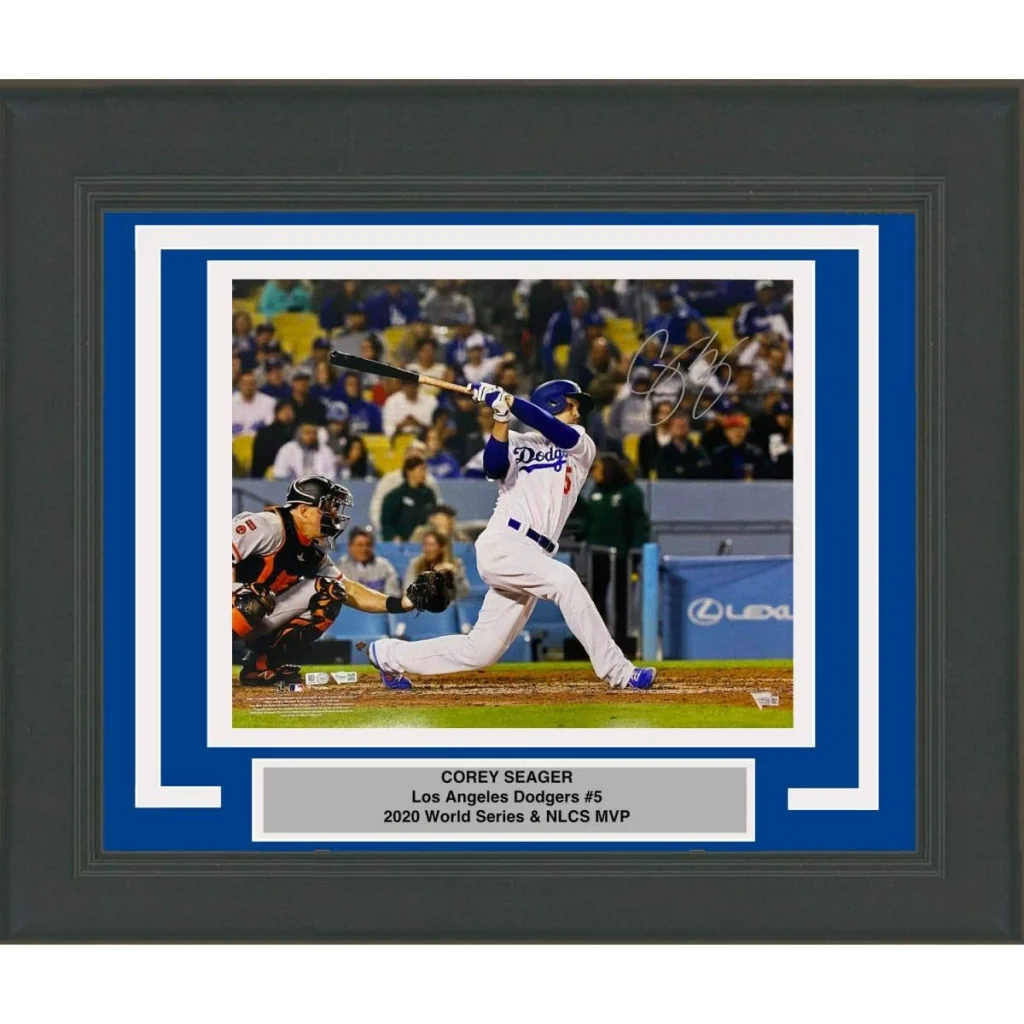Framed Corey Seager Dodgers autographed photo of him hitting a baseball for display