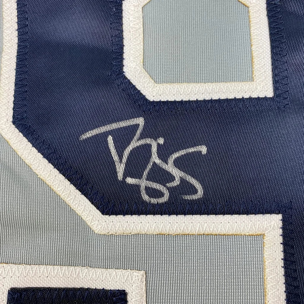 Dark blue and light gray Yankees jersey with autograph and framed photos