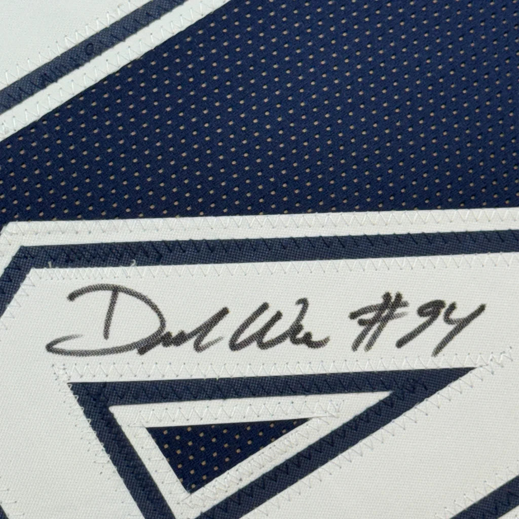 Autographed navy and white DeMarcus Ware Dallas Cowboys jersey with photos frame