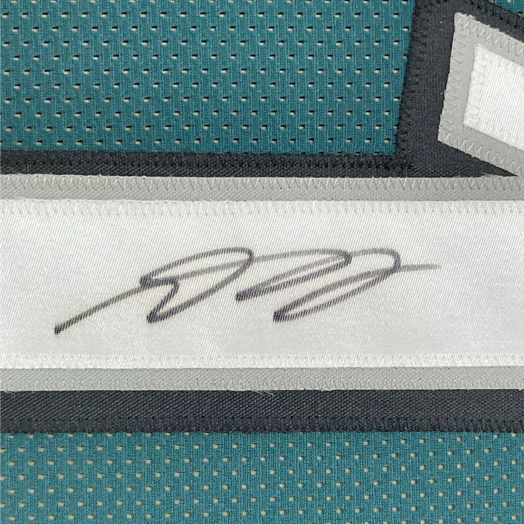 Framed autographed DeSean Jackson Philadelphia Eagles jersey label on teal mesh