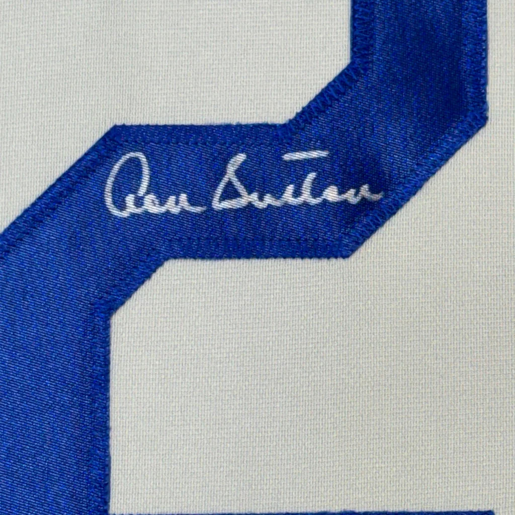 White sports jersey with blue number 2 and signature, perfect for your man cave