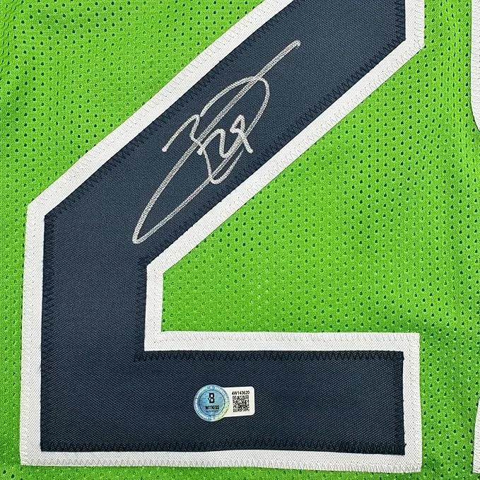 Framed autographed Earl Thomas III Seattle green jersey with navy 2 patch