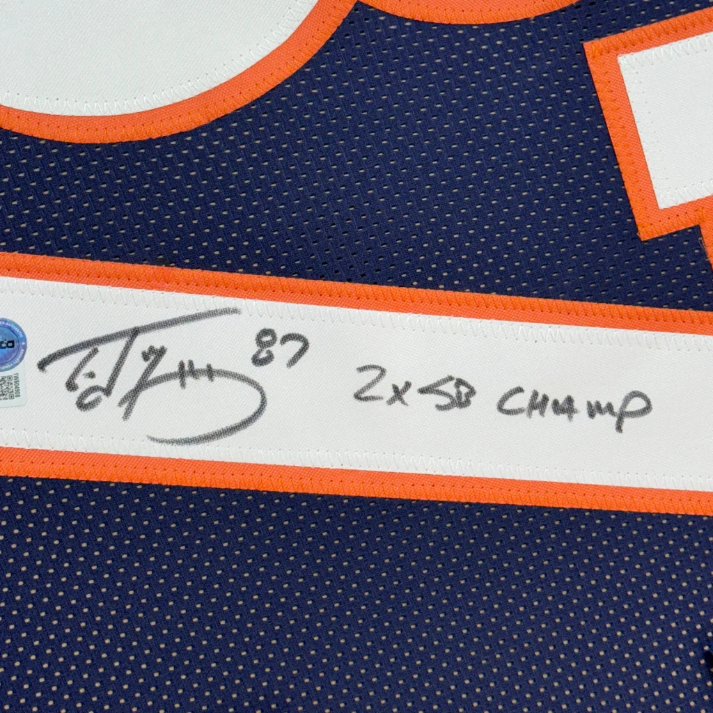 Professionally framed Ed McCaffrey Denver Broncos autographed jersey for display