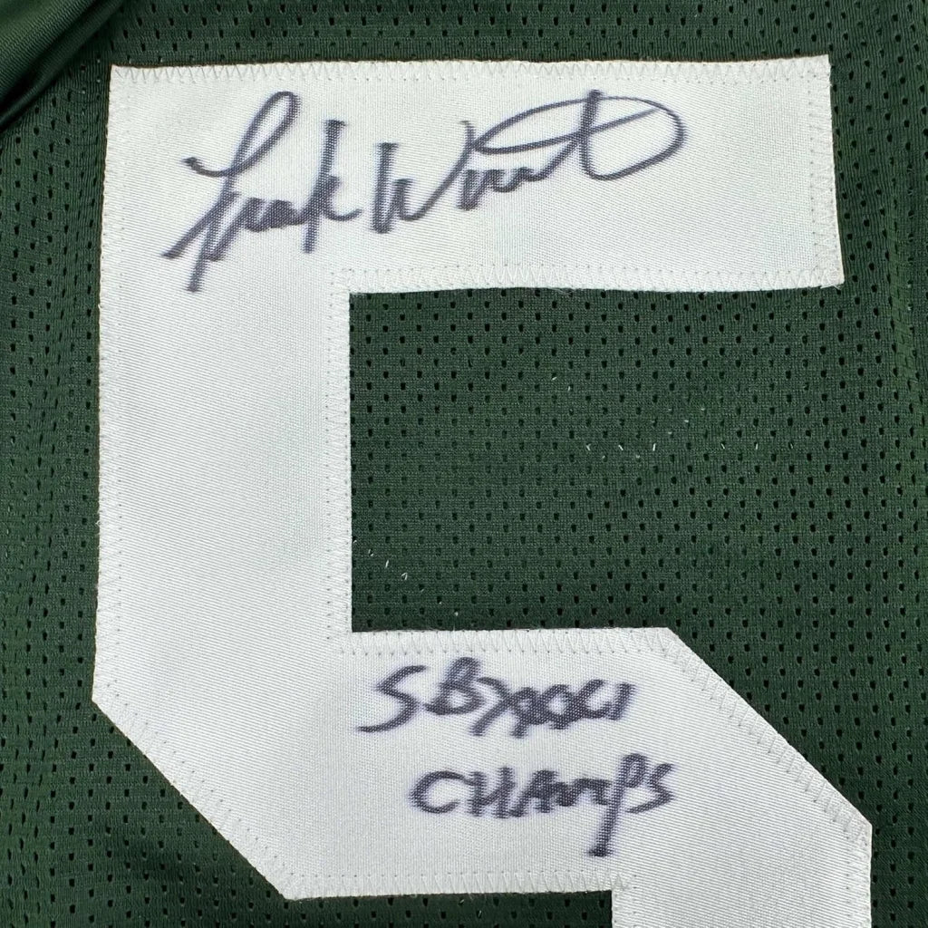Framed autographed green bay packers football jersey showing white embroidered number 5 with signature and inscription