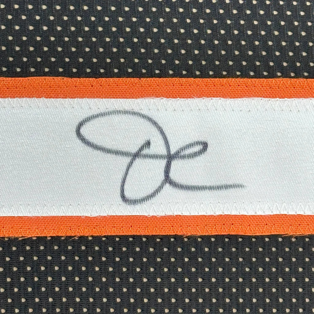 Framed signed Ja’Marr Chase Bengals jersey with white fabric label and JSA COA