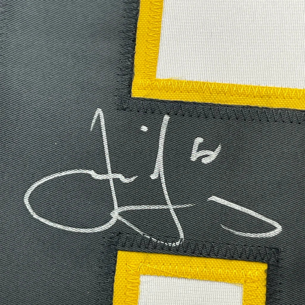 Autographed gray fabric matted display with yellow and white patches for your man cave featuring Jaromir Jagr