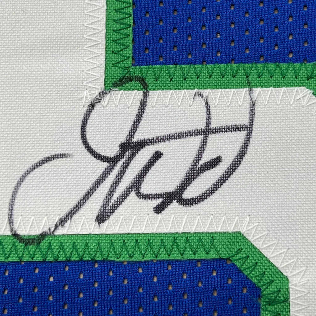 Autographed Jason Kidd Dallas Retro Blue Jersey in a professionally framed display