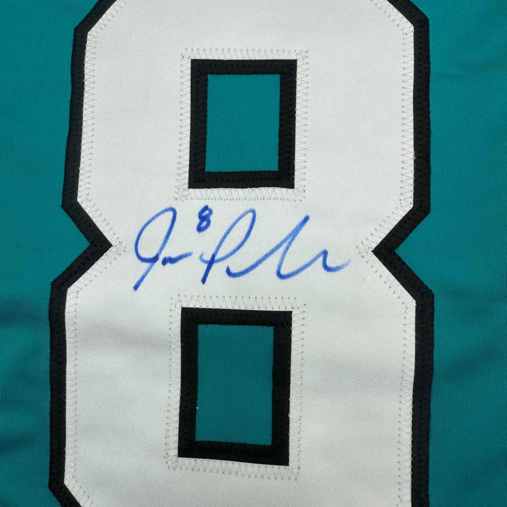Autographed San Jose teal hockey jersey number 8 in a professionally framed display