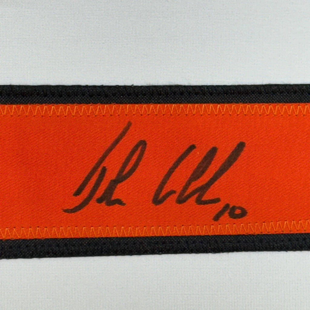 Orange fabric ribbon with black border in John LeClair Signed Flyers Jersey display