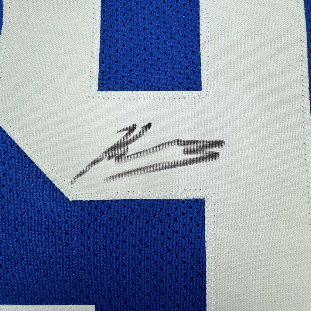 Blue and white Seattle Seahawks jersey with black marker autograph ready to display