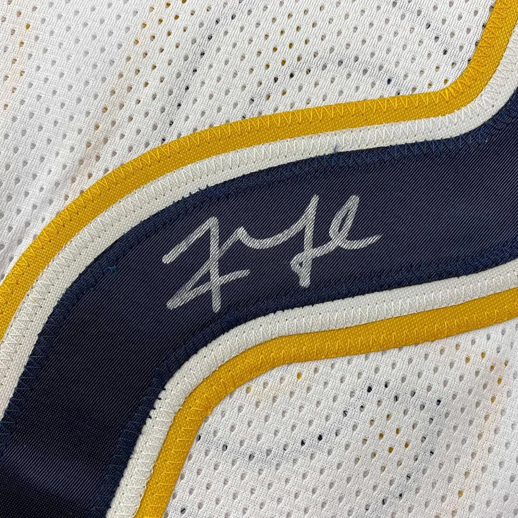 Autographed Khalil Mack Chargers jersey with navy and gold trim for your man cave