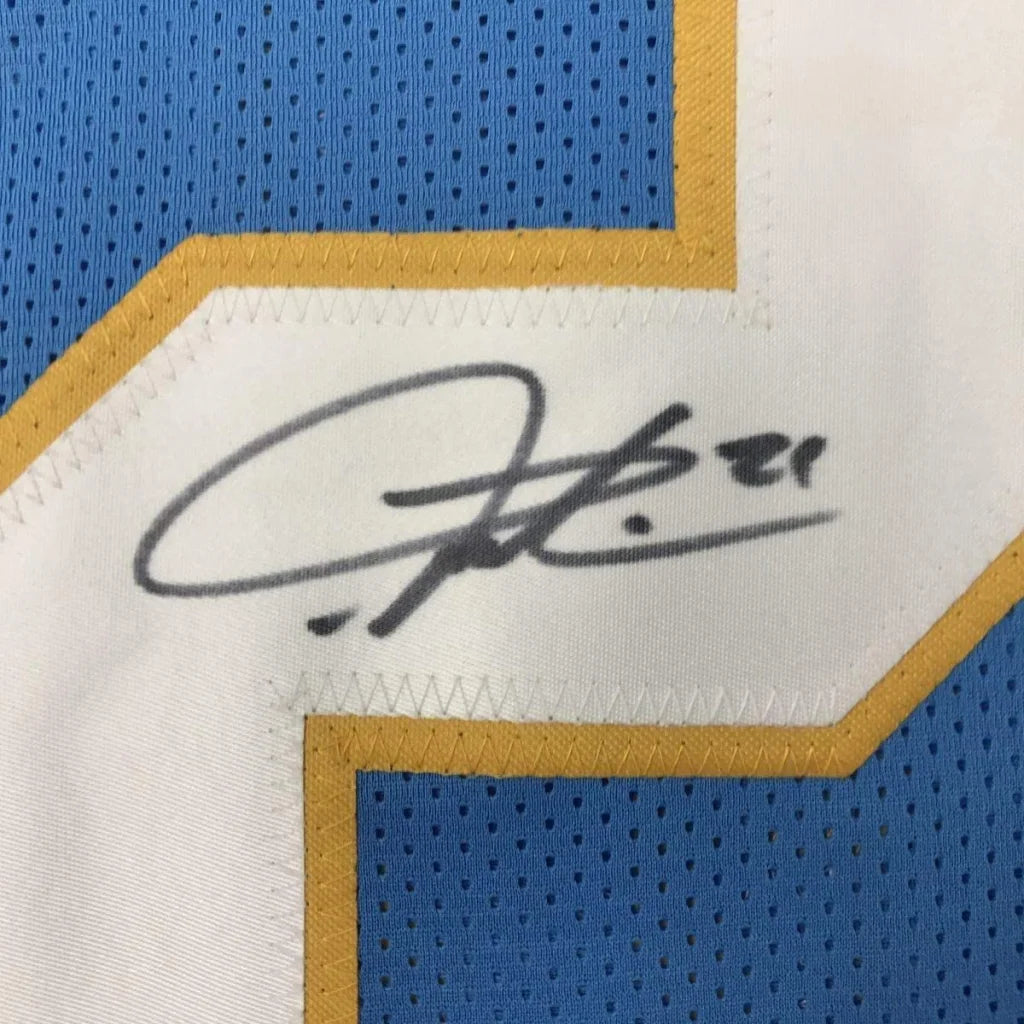Framed LaDainian Tomlinson signed black ink patch on powder blue jersey