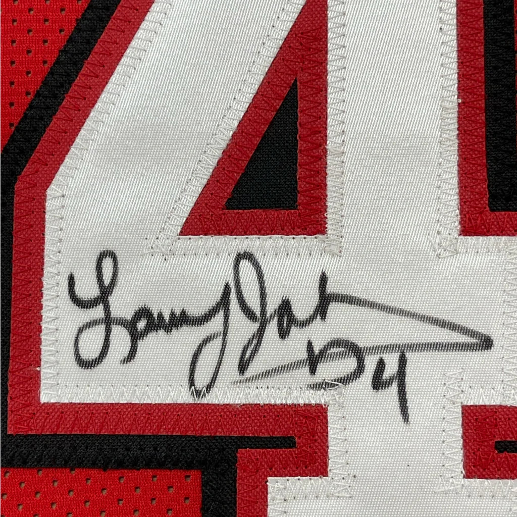 Framed autographed Larry Johnson UNLV red jersey with black ink signature