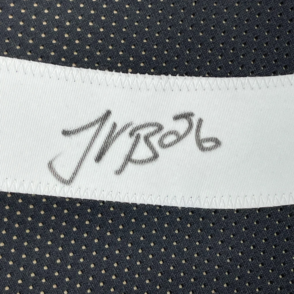 White fabric strip with Le’Veon Bell signature on black mesh for Steelers jersey display