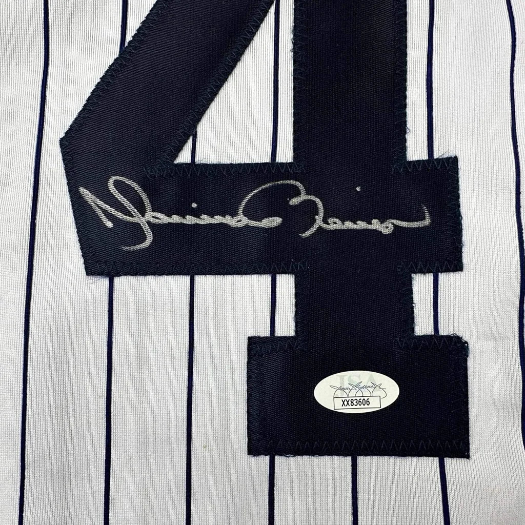 Autographed pinstriped Yankees jersey with Mariano Rivera signature, professionally framed