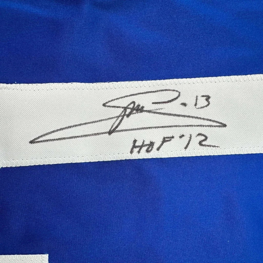 Blue fabric with white stripe and black autograph on Mats Sundin Toronto Maple Leafs Jersey