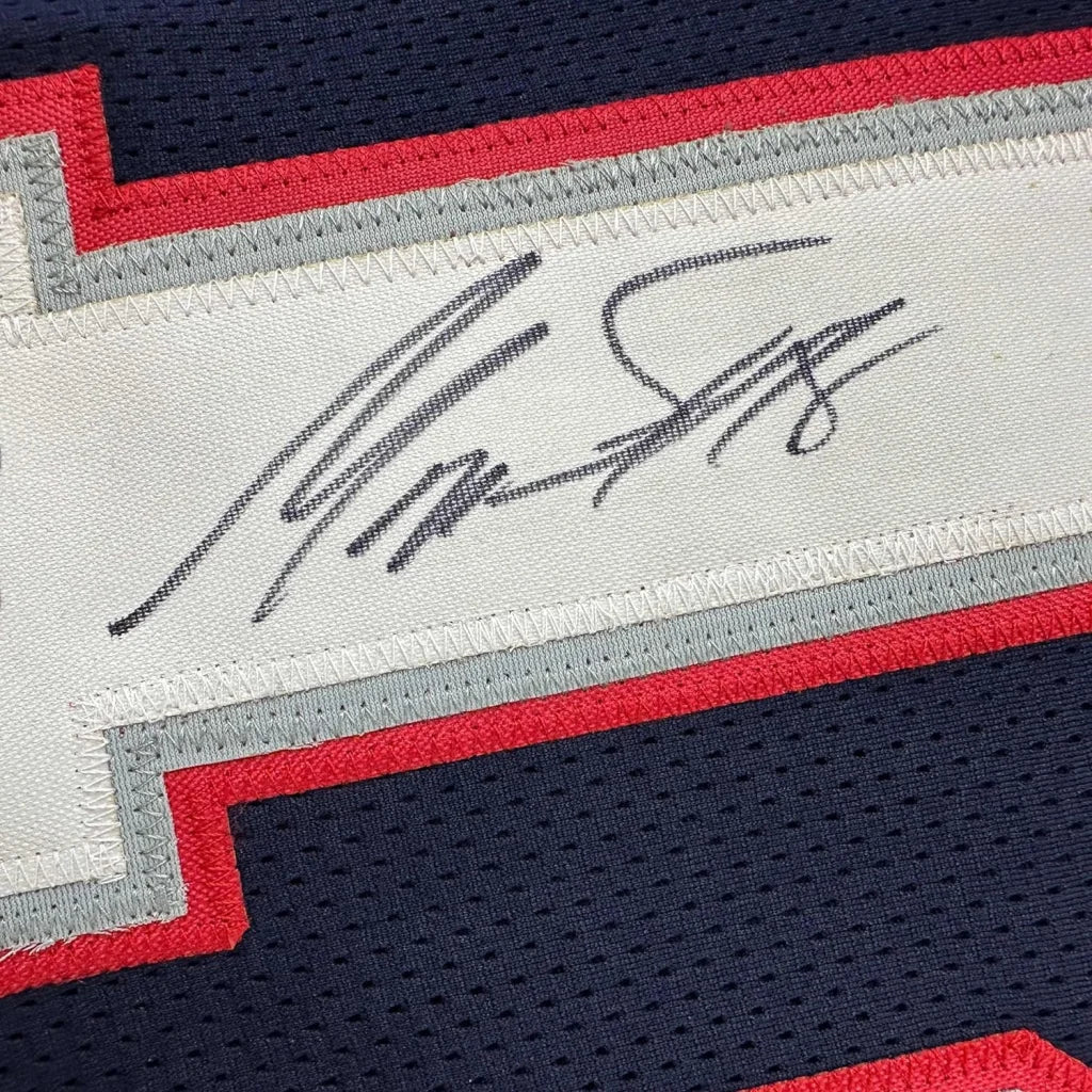 Autographed Matthew Slater Patriots jersey in a professionally framed display with Beckett BAS COA
