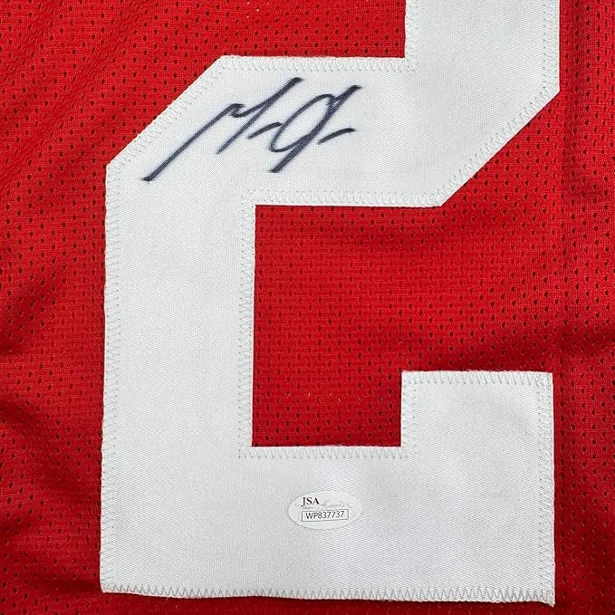 Back of framed autographed Melvin Gordon Wisconsin red mesh football jersey with C and JSA COA