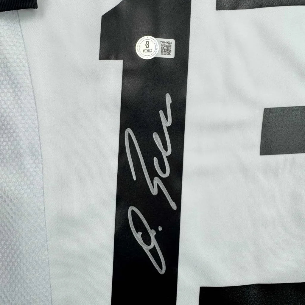 Back of framed autographed Michael Ballack Germany white soccer jersey with black number one, Beckett BAS COA