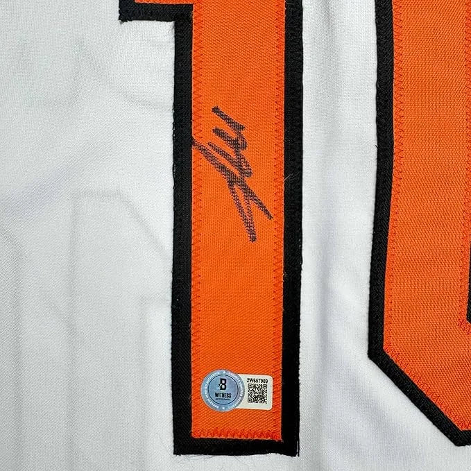 Framed Autographed Miguel Tejada 35x39 Baltimore White Baseball Jersey Beckett BAS COA | Certified Authentic Signed Memorabilia | vintageantiquesgifts.com