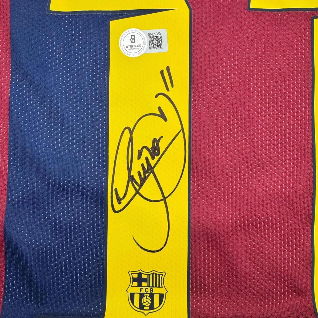 Autographed Barcelona football jersey with Neymar Jr signature and action photos in frame