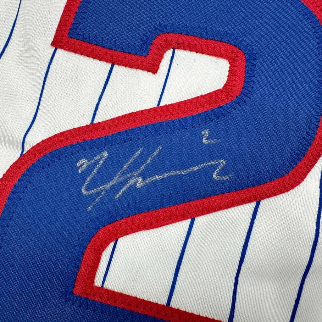 Autographed Nico Hoerner Chicago baseball jersey with number 2 in blue and red outline