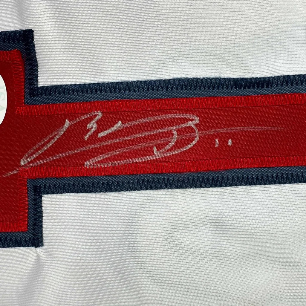 Framed autographed Rafael Devers Boston white baseball jersey with silver signature