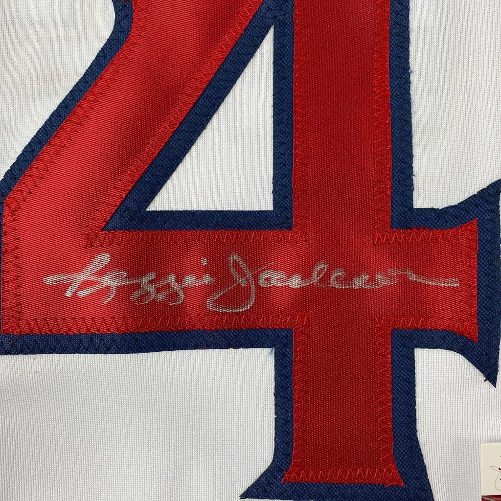 Autographed Reggie Jackson red and blue jersey number 4 ready to display