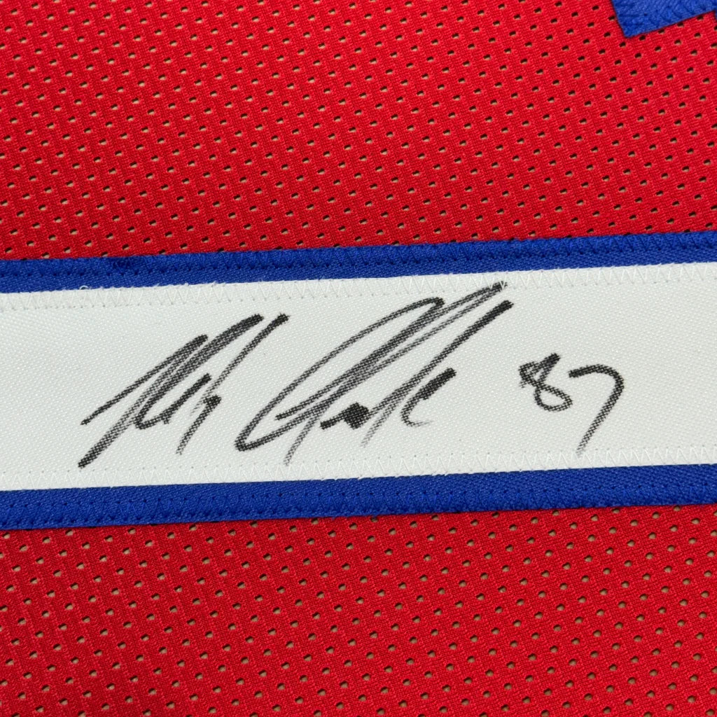 Red Rob Gronkowski signed Patriots jersey with autograph displayed in a frame