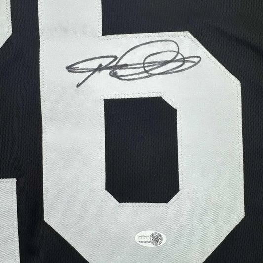 Black jersey with white numbers and autograph, professionally framed for your man cave