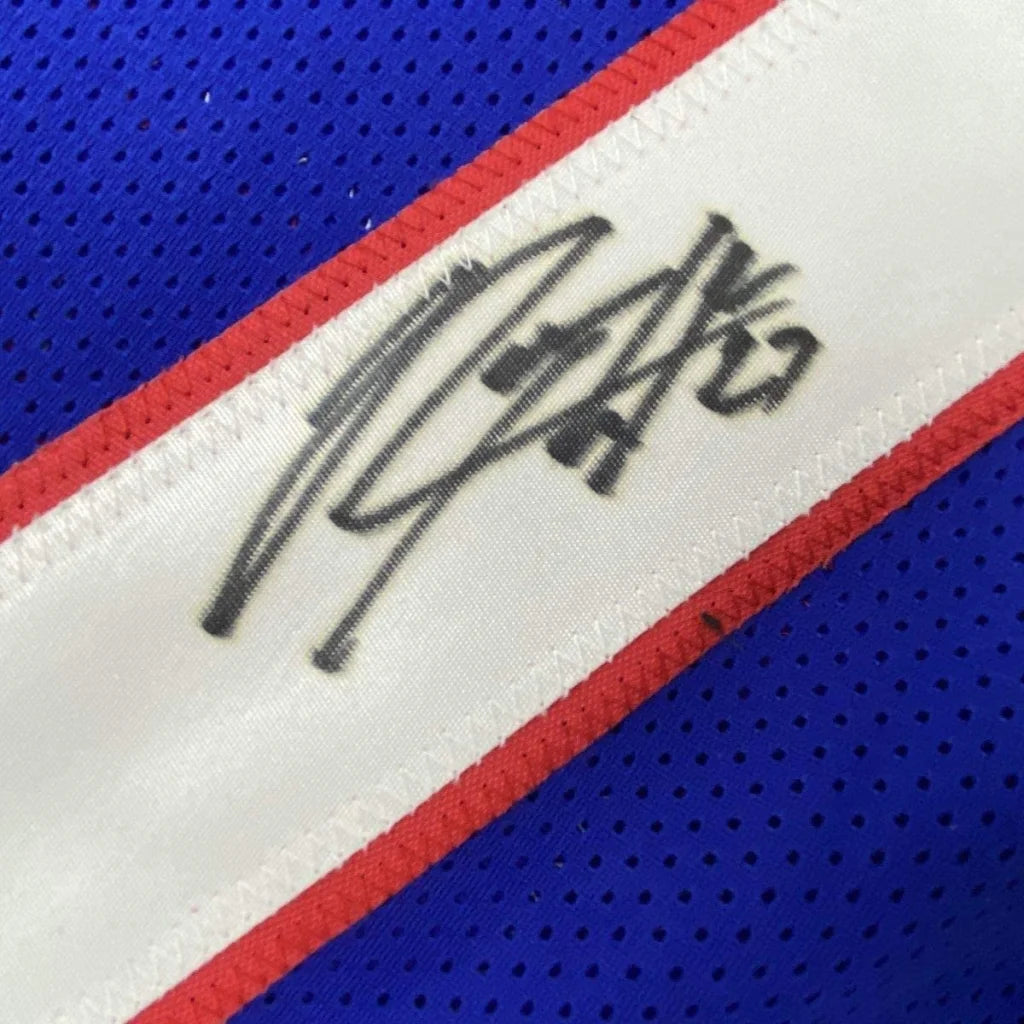 Professionally framed Lawrence Taylor Giants jersey with Rodney Hampton autograph