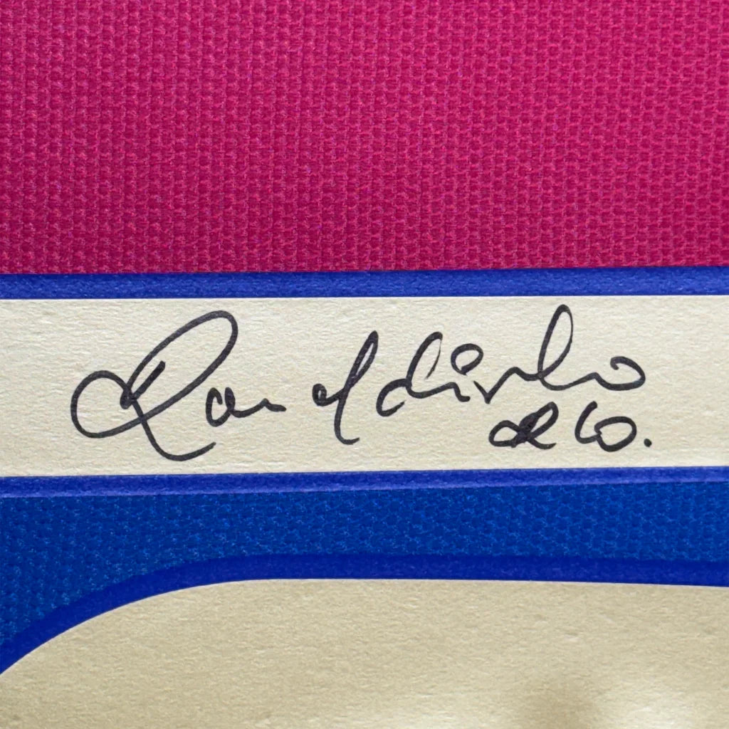 Vibrant pink blue textured notebook with Carlo di Lino 2016 signature band, framed Ronaldinho jersey display