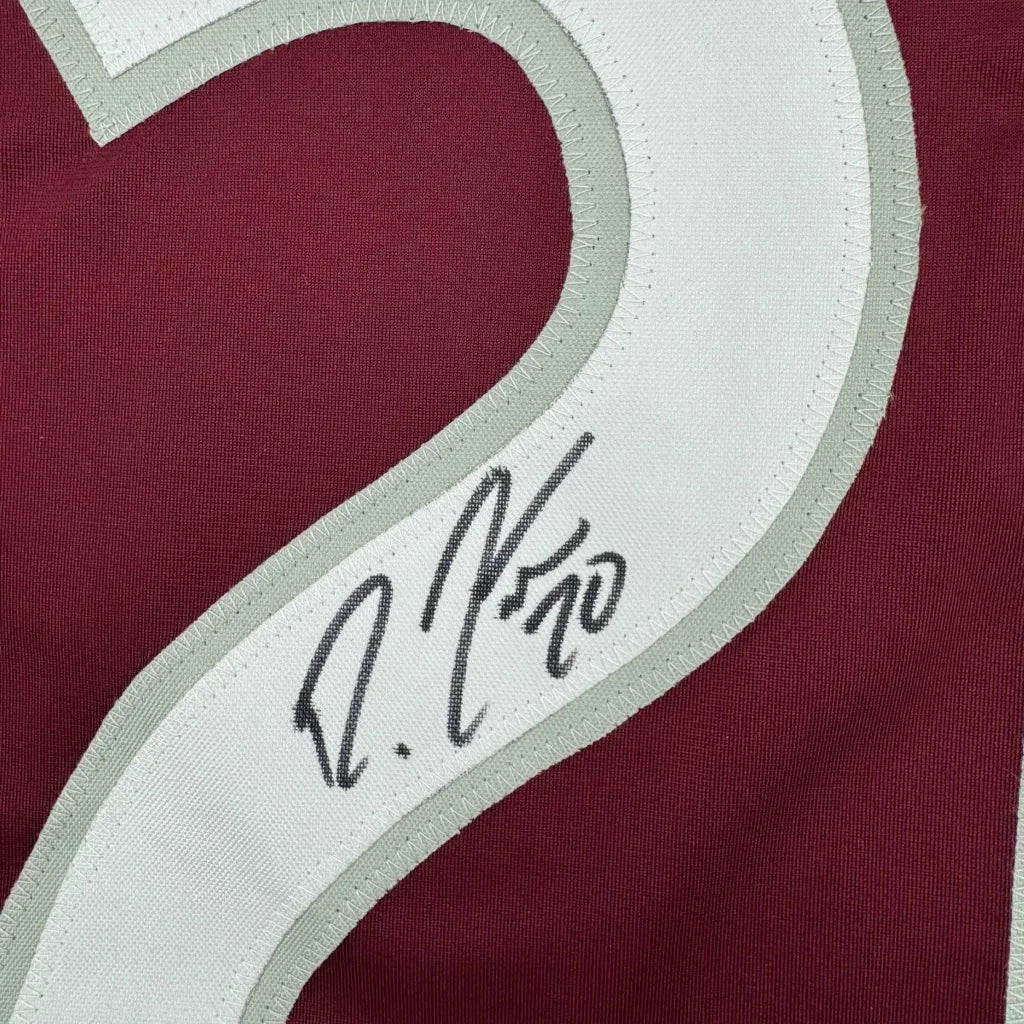 Maroon hockey jersey with white gray number 2 and black signature ready to display