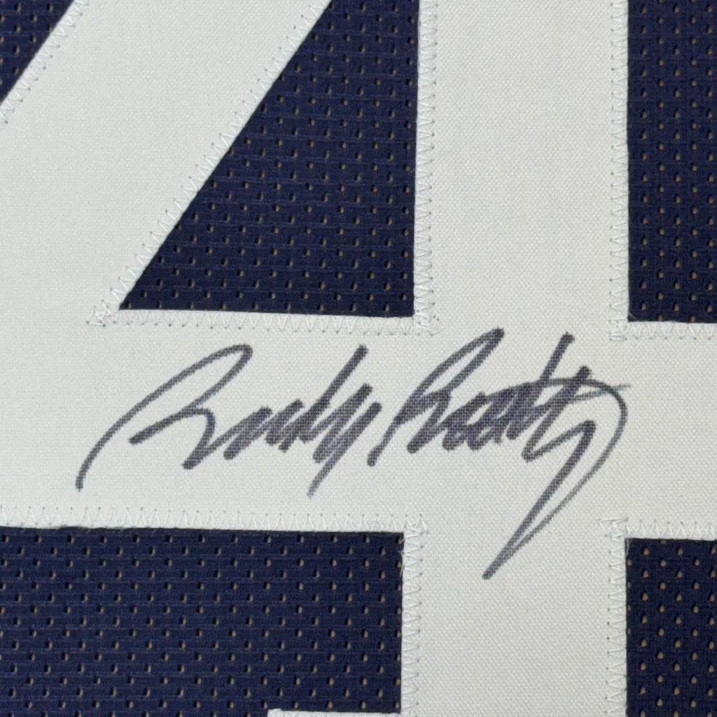 Framed Autographed Rudy Ruettiger 35x39 Never Quit Notre Dame Blue College Football Jersey JSA COA | Certified Authentic Signed Memorabilia | vintageantiquesgifts.com
