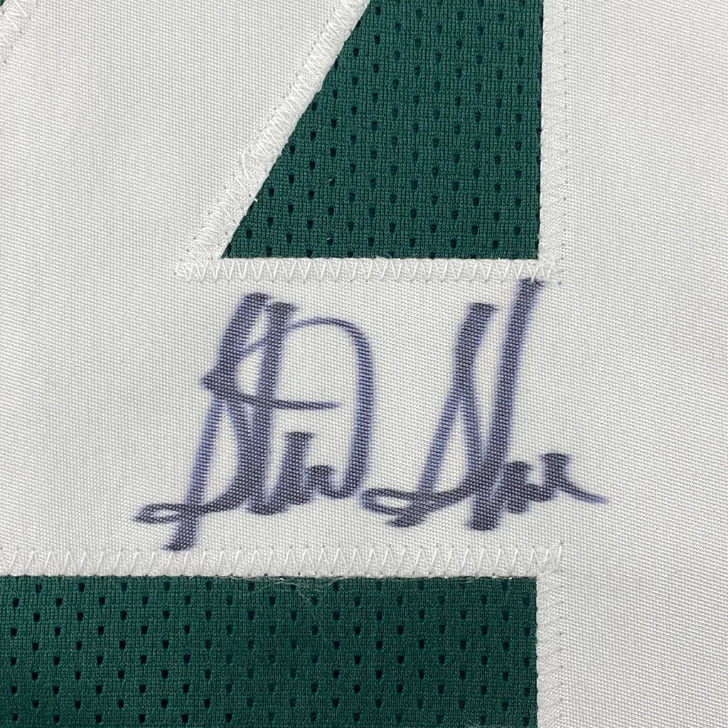 Framed autographed white and green mesh sterling sharpe football jersey with purple stitched signature and Beckett BAS COA