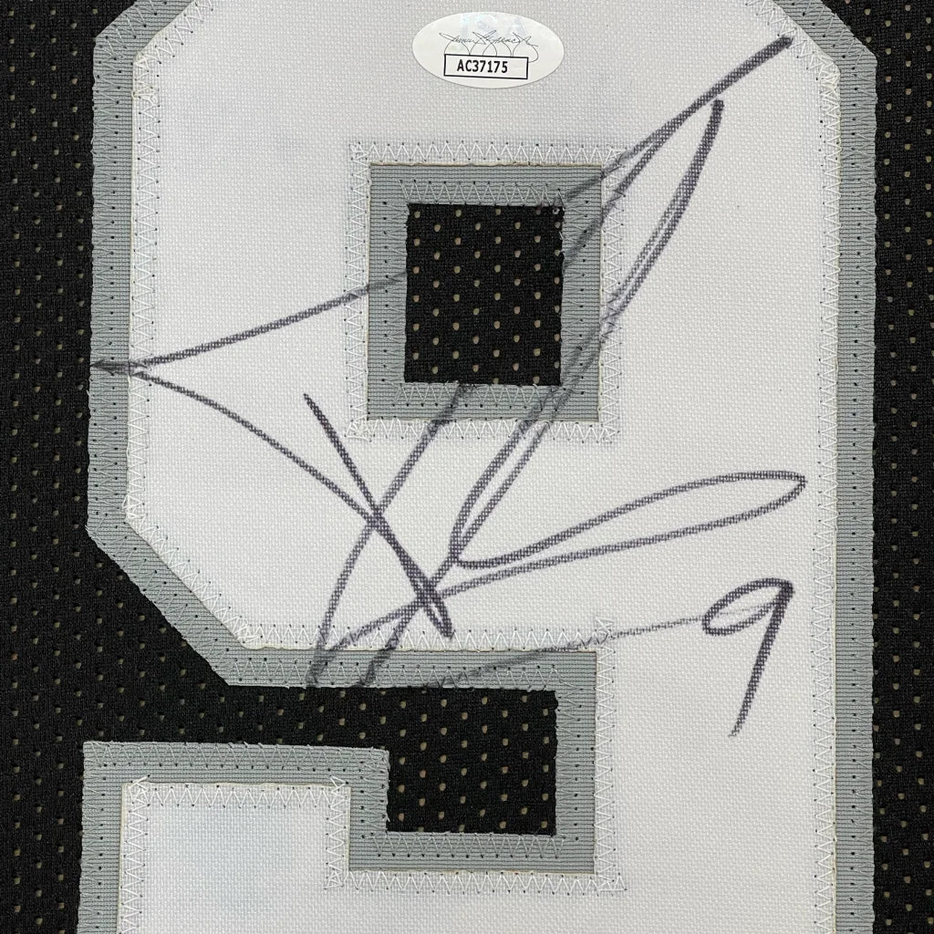 Black and white Tony Parker Spurs jersey with black ink autograph ready to hang