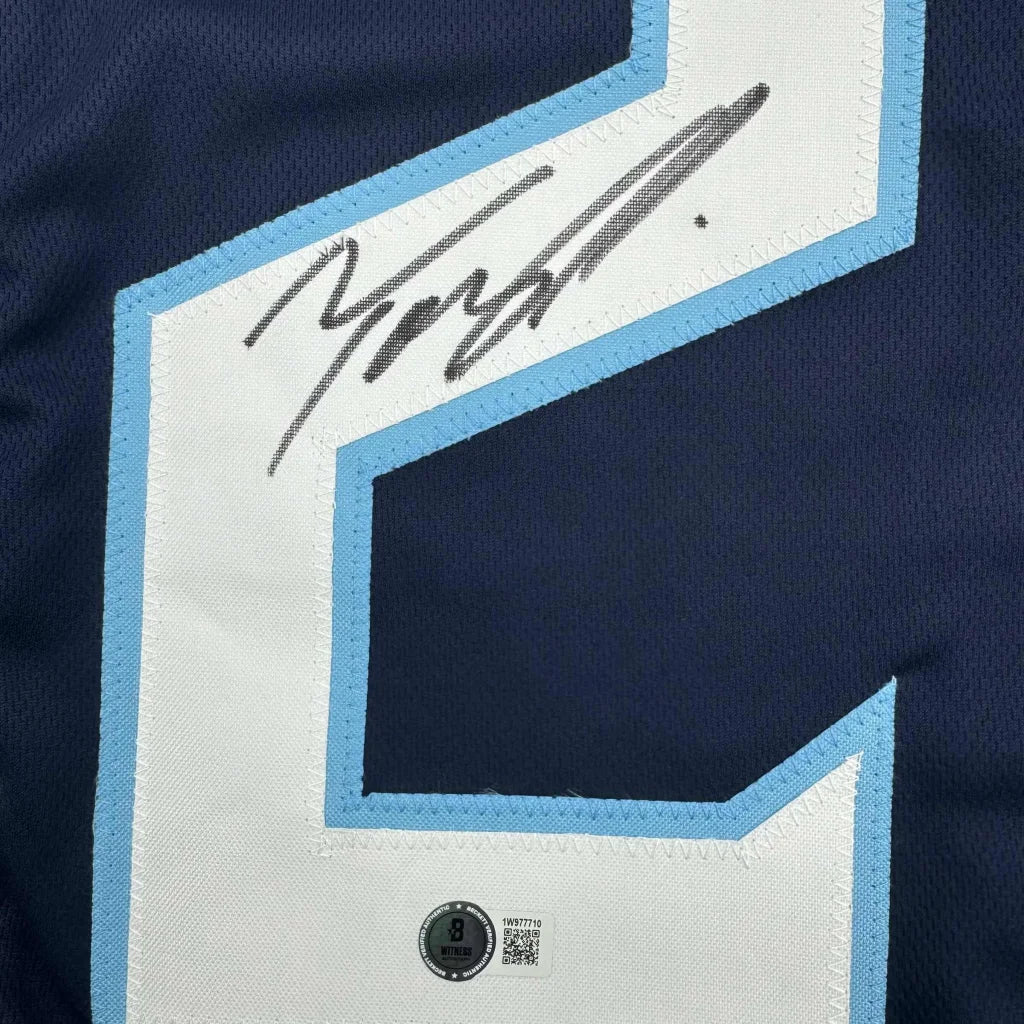 Autographed Tennessee Blue Football Jersey professionally framed with light blue and white number 2