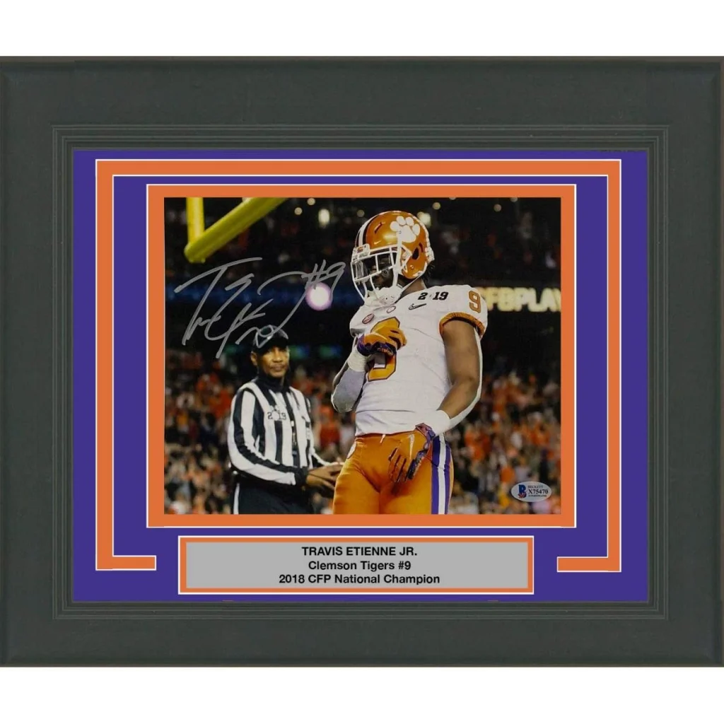 Framed Autographed Travis Etienne Jr Clemson Tigers 8x10 College Football Photo Beckett BAS COA #4 | Hall of Fame Sports Memorabilia | vintageantiquesgifts.com