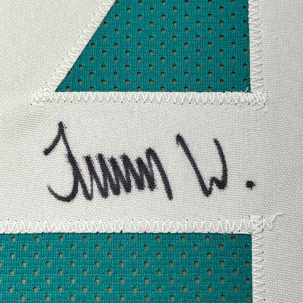 Framed Autographed Travon Walker 35x39 Jacksonville Teal Football Jersey Beckett BAS COA | Certified Authentic Signed Memorabilia | vintageantiquesgifts.com