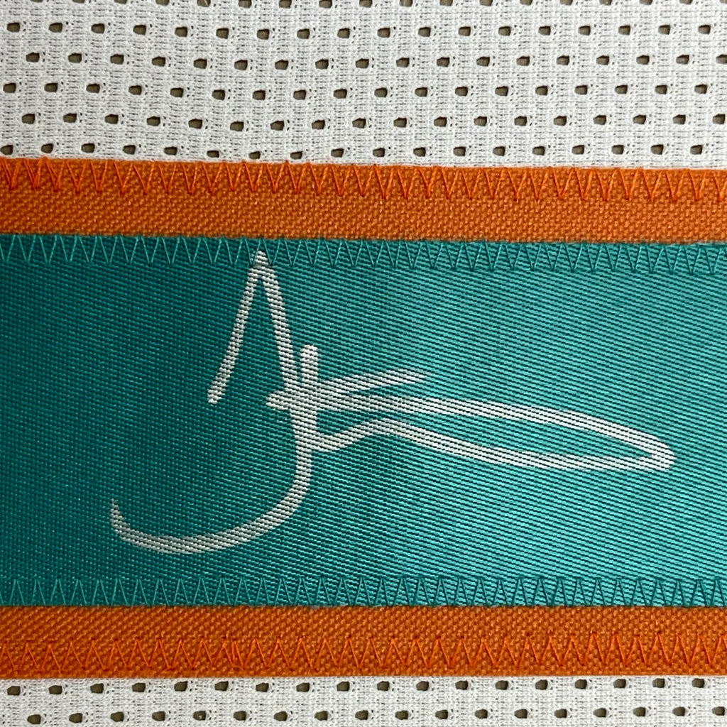 Framed autographed Tyreek Hill Miami white football jersey with teal orange stripes