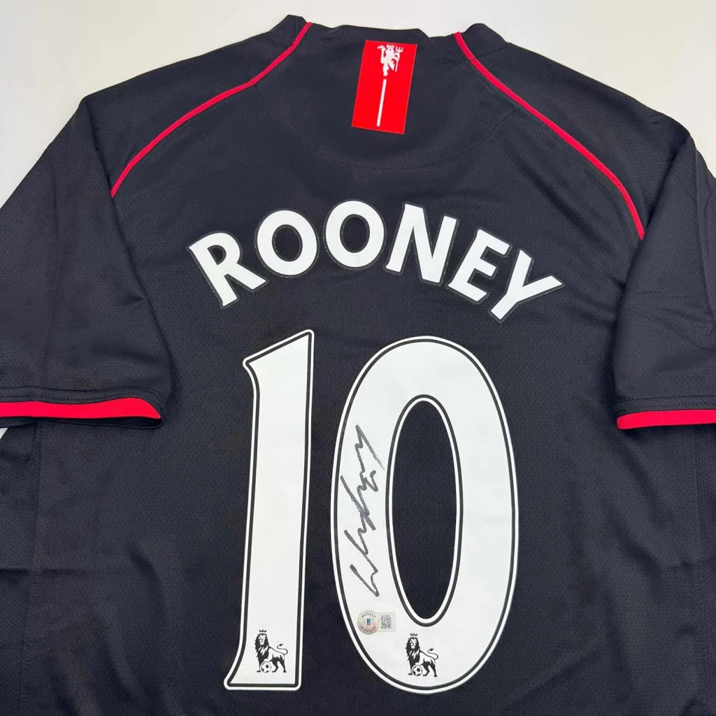 Framed Autographed Wayne Rooney 35x39 Manchester United Black 2008 Soccer Jersey Beckett BAS COA | Certified Authentic Signed Memorabilia | vintageantiquesgifts.com