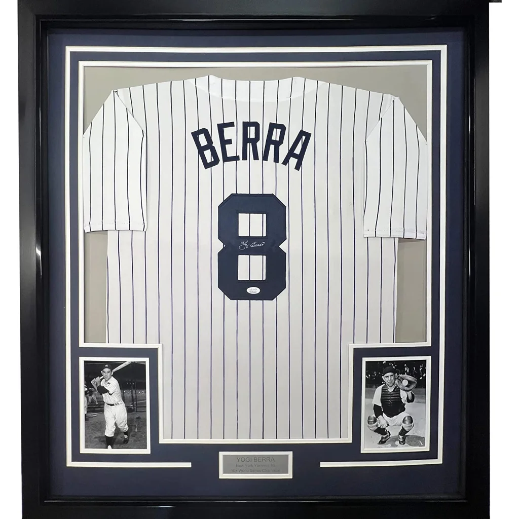 Framed white pinstripe Berra jersey with navy blue 8, professionally framed