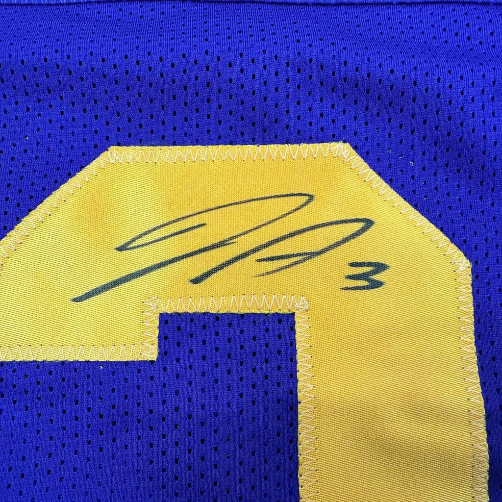 Purple mesh Vikings Addison jersey with yellow number and black autograph for sale