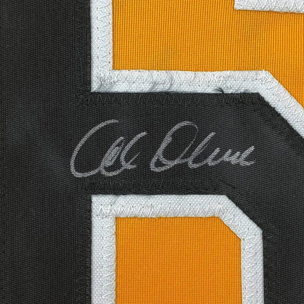 Black and orange sports jersey with white autograph, perfect for hanging decor