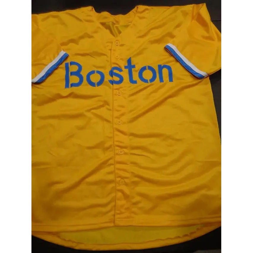 Yellow Boston Red Sox jersey with blue and white striped sleeves worn by Franchy Cordero