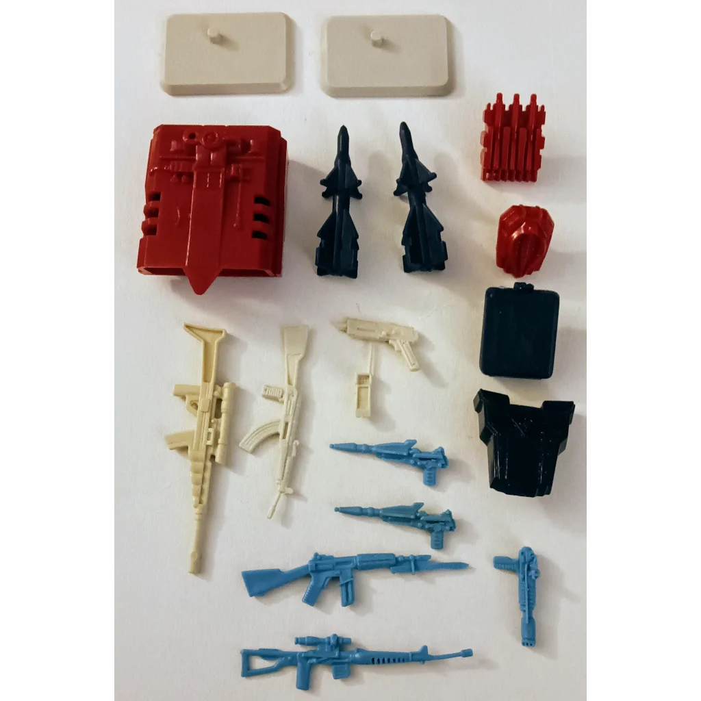 Vintage GI Joe Cobra battle gear accessory pack with toy soldiers, red helmets, black shields