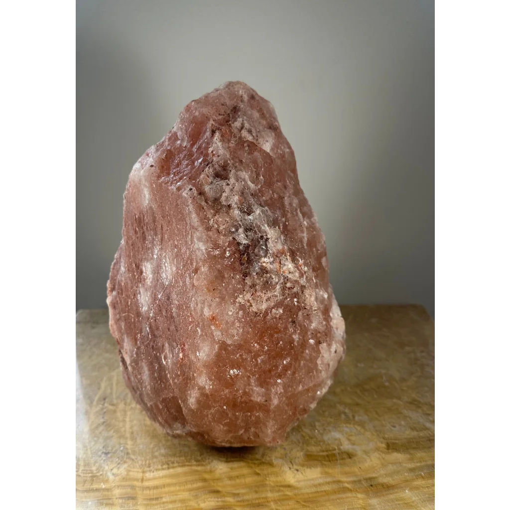 Natural rough Himalayan pink salt lamp with textured glow